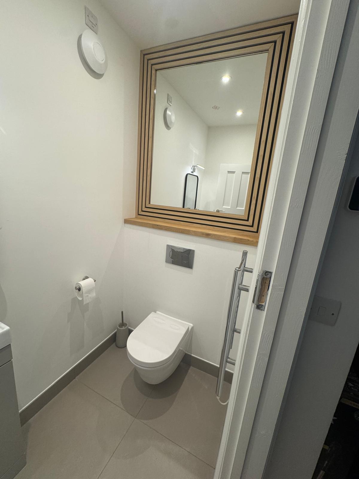 Bespoke mirror surround